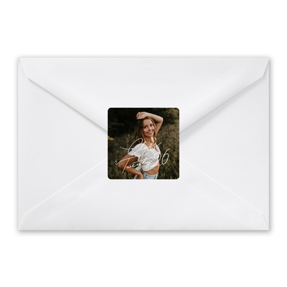 white envelope with photo area and text