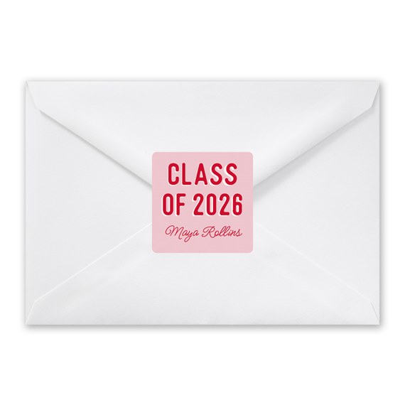 white envelope with pink and red sticker