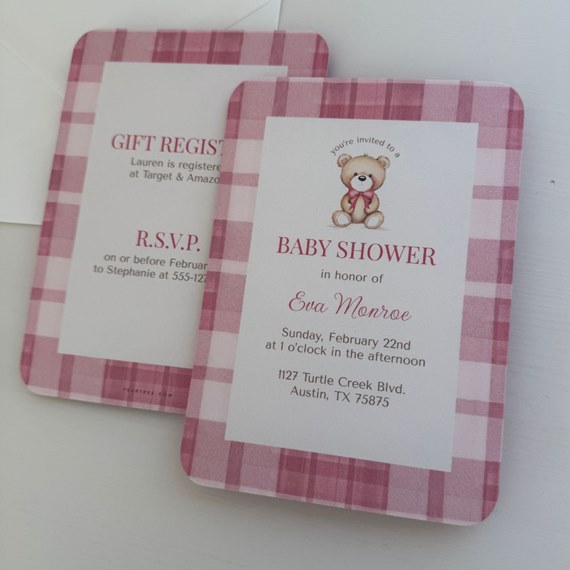 two baby shower invitations with plaid design and teddy bear