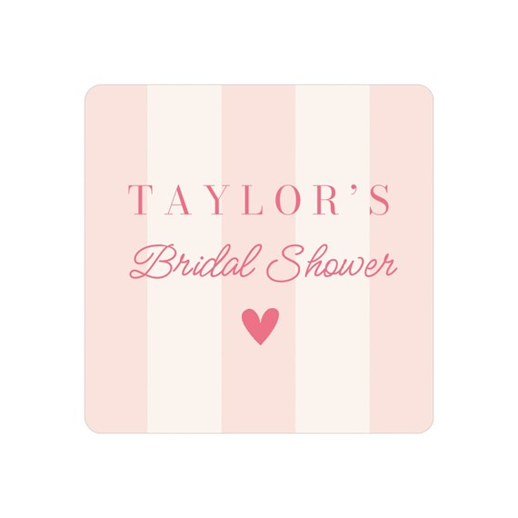 pink and white striped envelope seal with text and heart