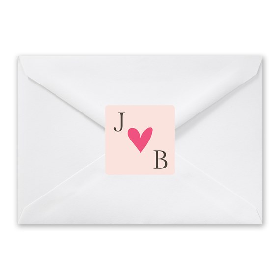 envelope with heart seal and initials