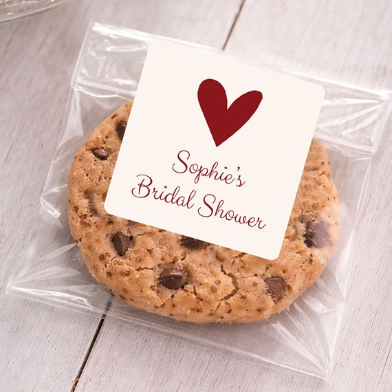 sticker with heart design and text on cookie bag