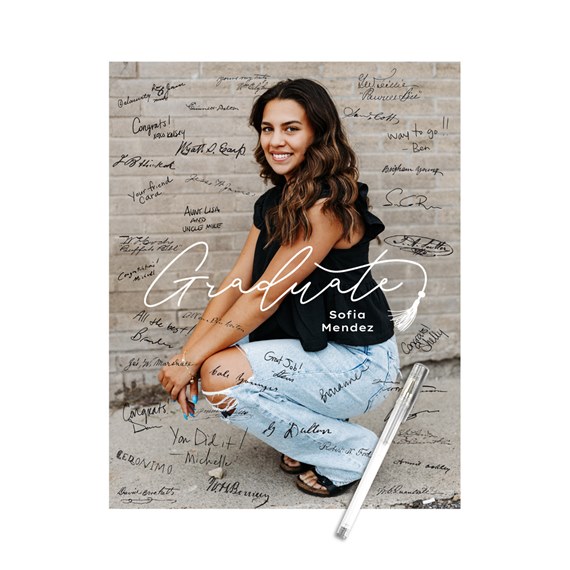 signature poster with handwritten messages and 'Graduate' text