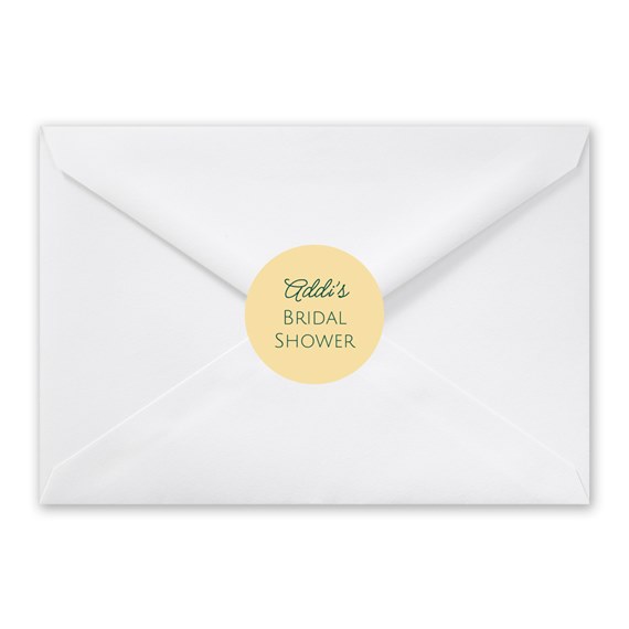 white envelope with a circular seal for bridal shower