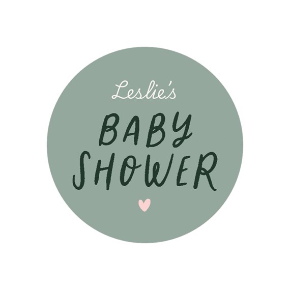 circular baby shower sticker with text and heart design