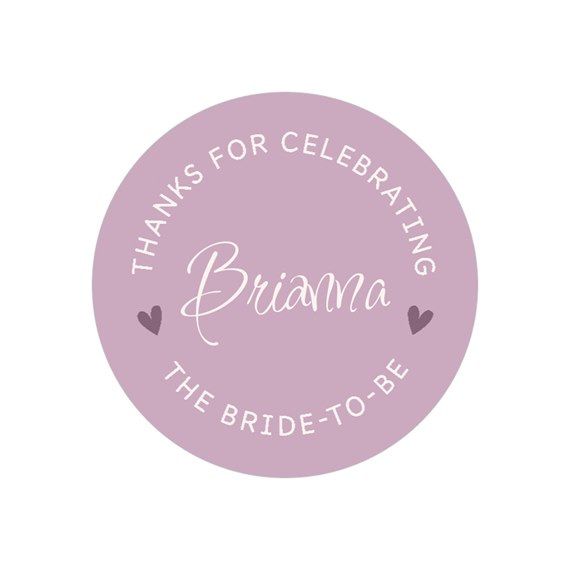 round sticker with text and hearts