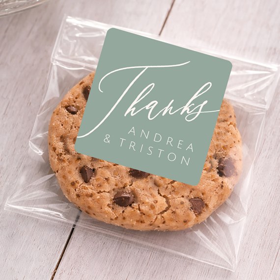 sticker with thanks message and names on cookie bag