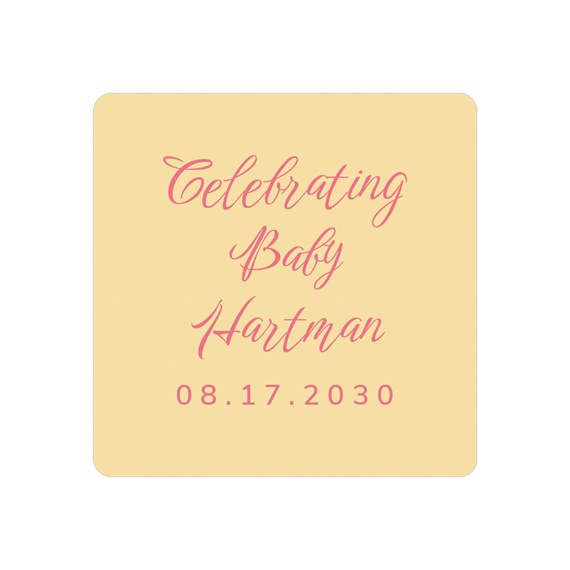 yellow sticker with pink text