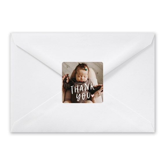 white envelope with thank you sticker and photo area