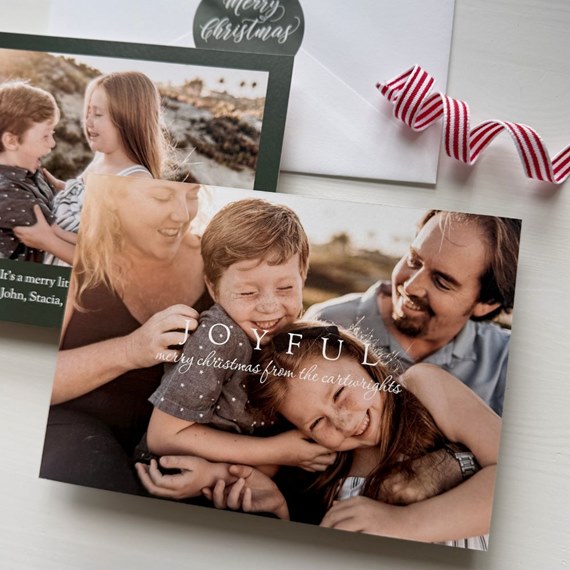 Christmas card with family photo and text