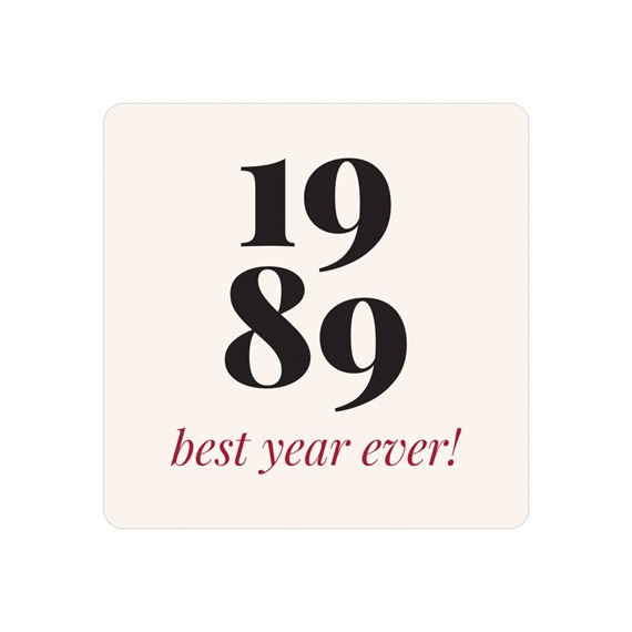 beige sticker with bold black numbers and red text