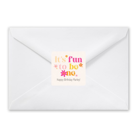 white envelope with colorful seal and text