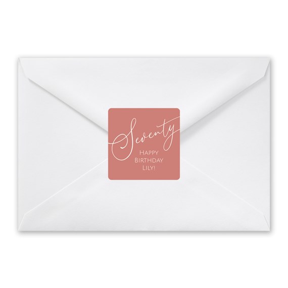 white envelope with coral seal and script text