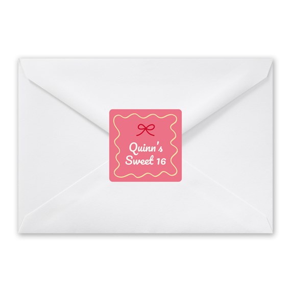 pink seal with text on white envelope