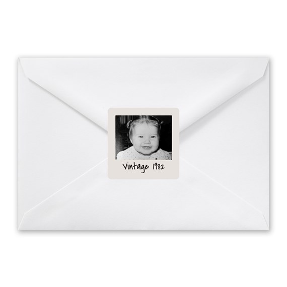 white envelope with photo placeholder and text area