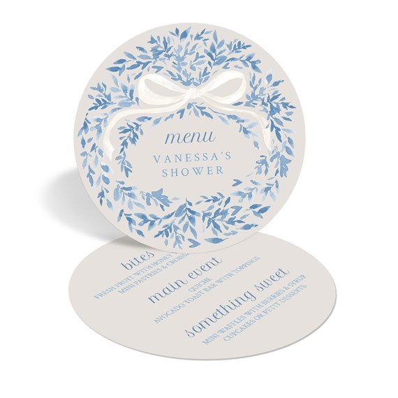 round menu card with blue leaf wreath and white bow, customizable text area
