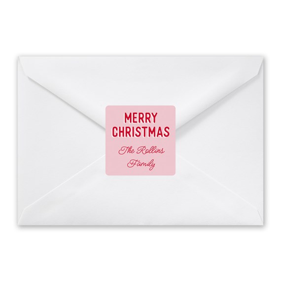 white envelope with pink and red label