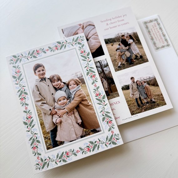Christmas card with botanical border and photo area