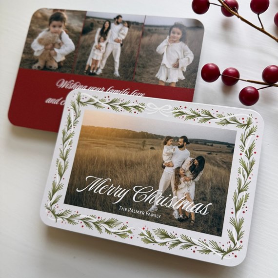 holiday card with photo placeholders and festive design