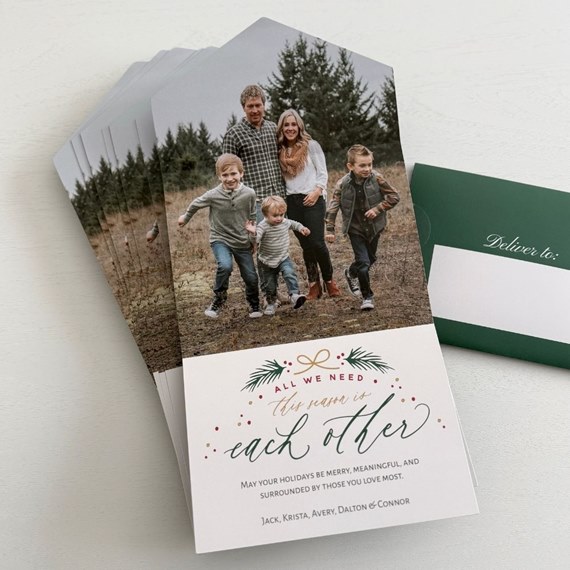Christmas card with family photo area and festive text