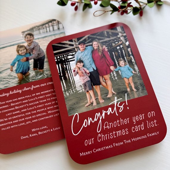 holiday card with family photo placeholder and festive text