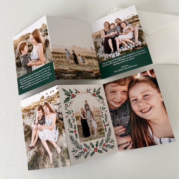 Christmas card with photo placeholders and holly design
