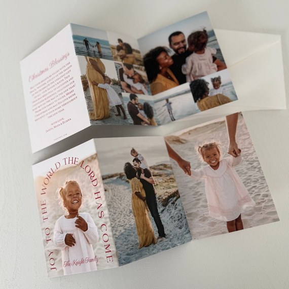 folded christmas card with photo area and text