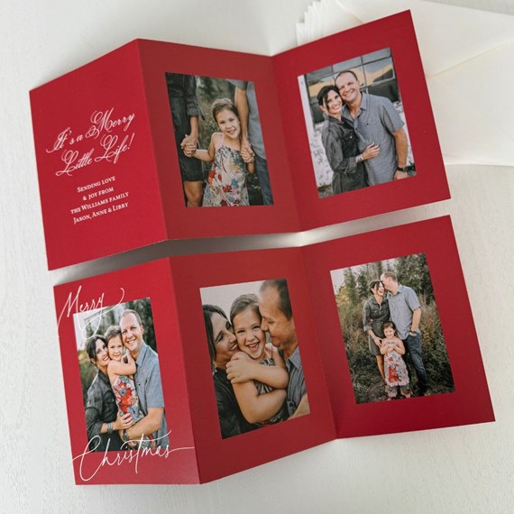 red Christmas card with photo placeholders and decorative text