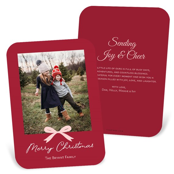 Christmas card with photo placeholder and decorative bow