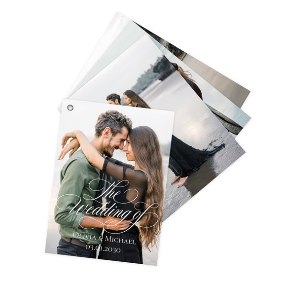 stacked wedding invitations with photo area and script text