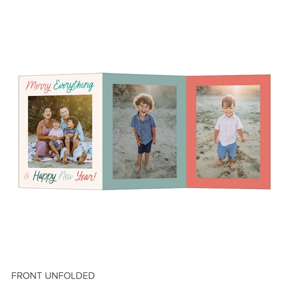 front of new year card with photo placeholders and festive text