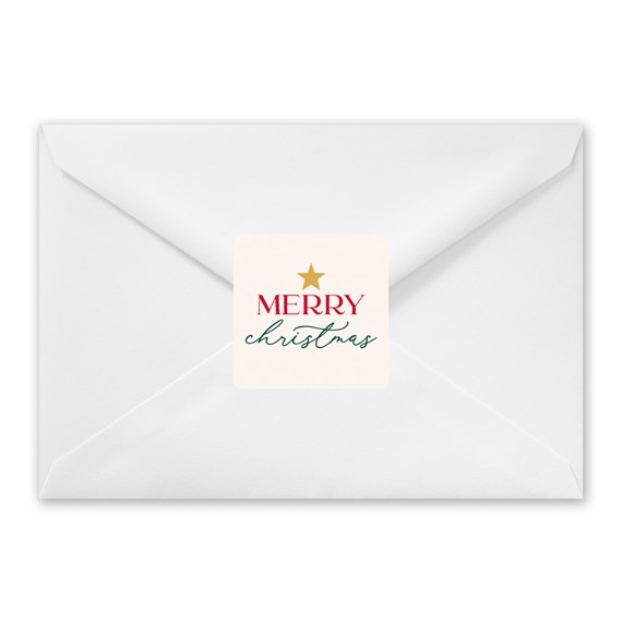 white envelope with 'MERRY christmas' seal and gold star