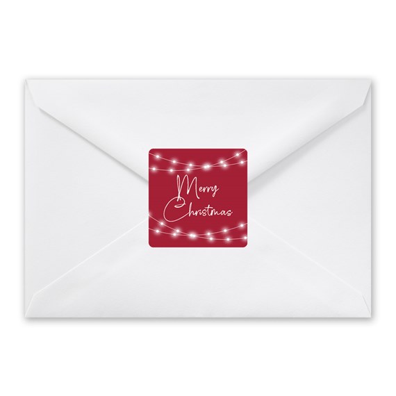 envelope with red seal and white lights