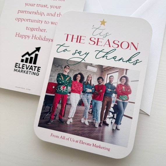 holiday card with photo area and festive text