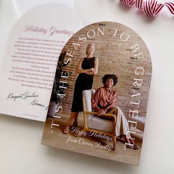holiday card with arched design and photo area