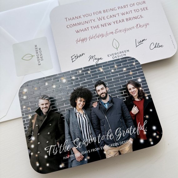 holiday card with photo area and festive text