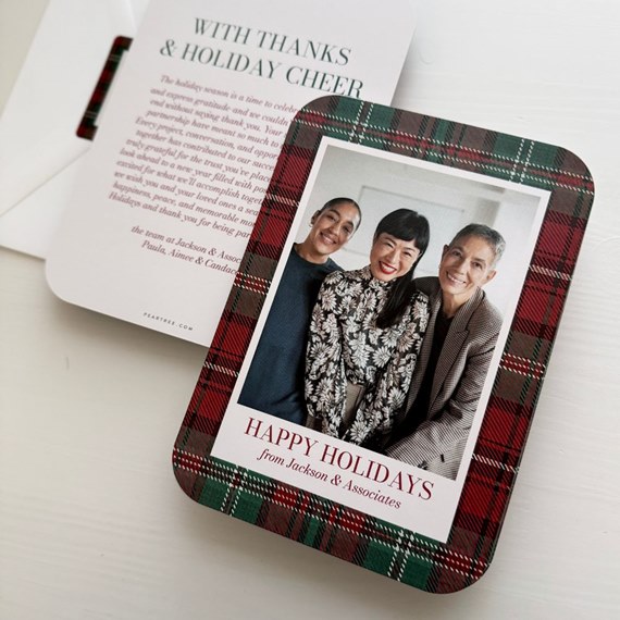 photo placeholder with plaid border and holiday greeting