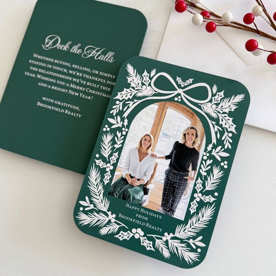 holiday card with botanical frame and photo area
