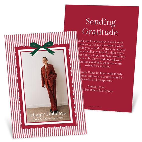 holiday card with photo area, scalloped border, green bow