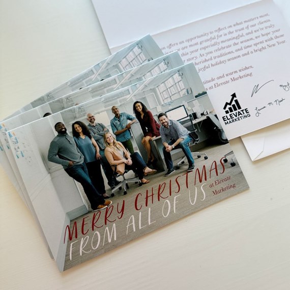 holiday card with group photo and text