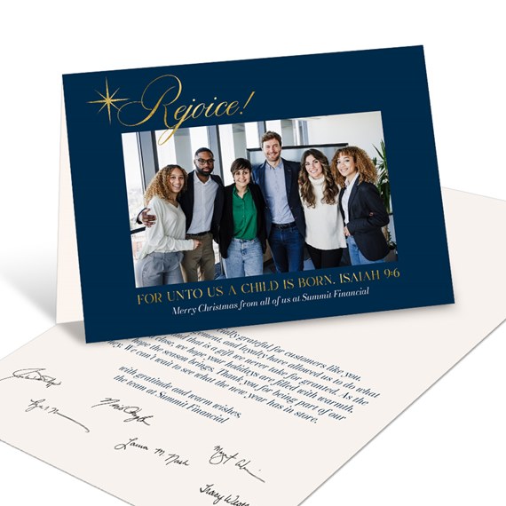 navy blue holiday card with photo area and gold text