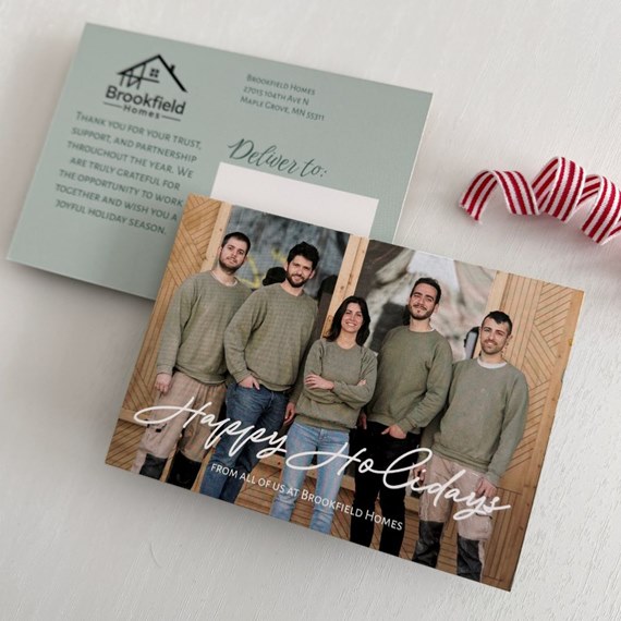 holiday postcard with photo area and script text