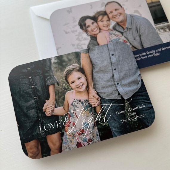 family photo area with text 'LOVE & Light' and holiday message