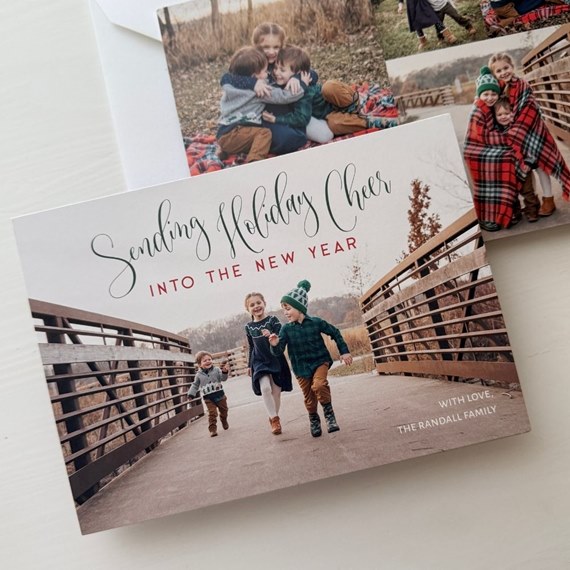 holiday card with photo area and festive text