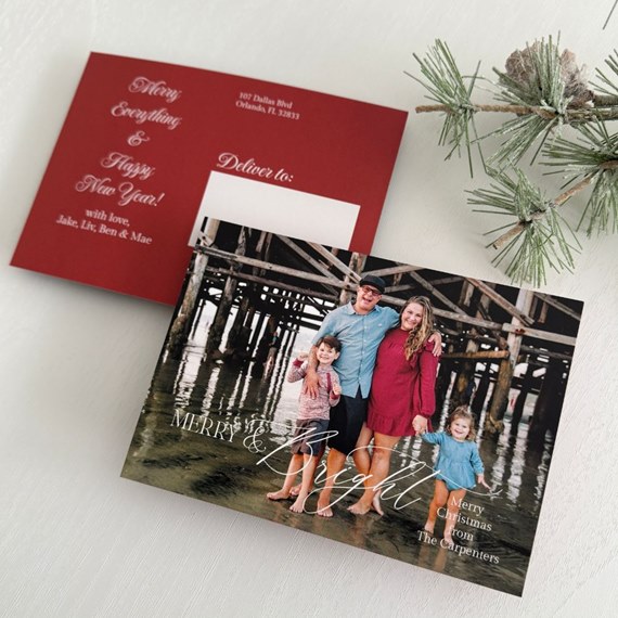 holiday postcard with family photo and red back