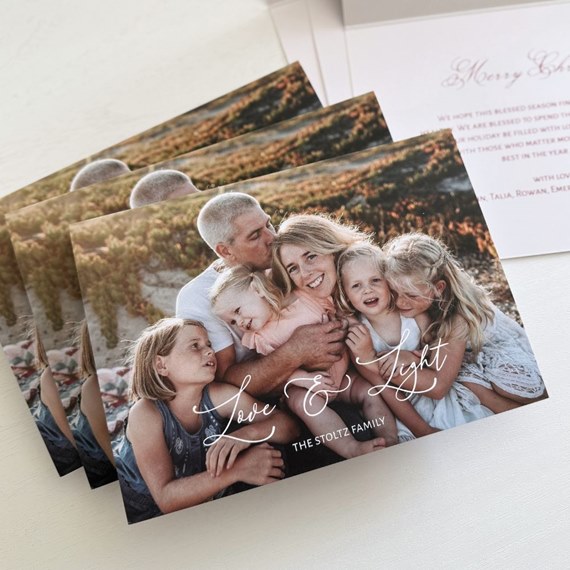 holiday card with family photo area and text 'Love & Light'