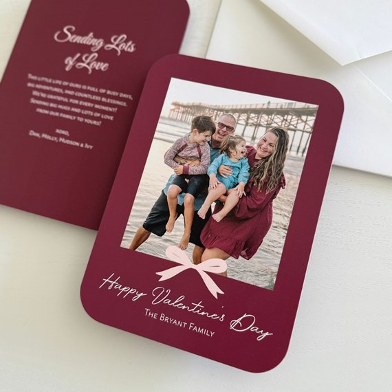 photo placeholder; rounded corner card with bow and text