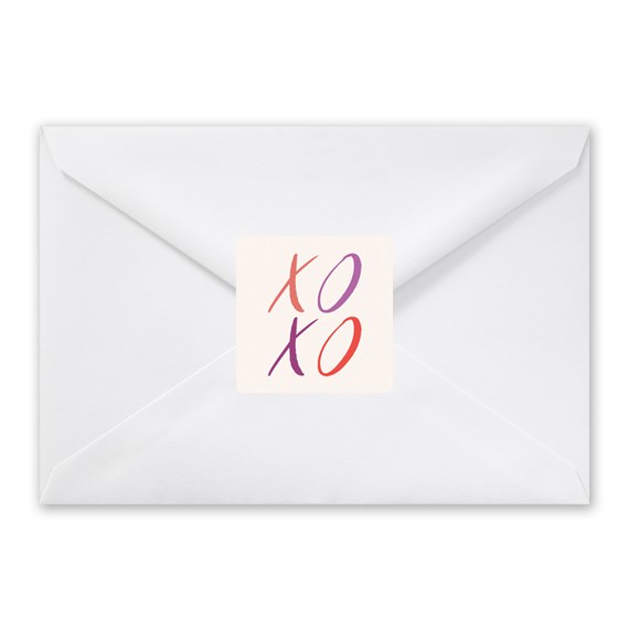 white envelope with xoxo seal