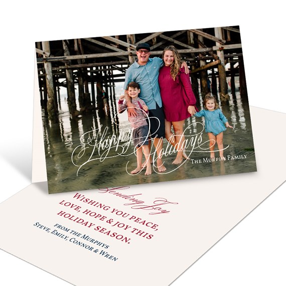 holiday card with family photo and decorative text