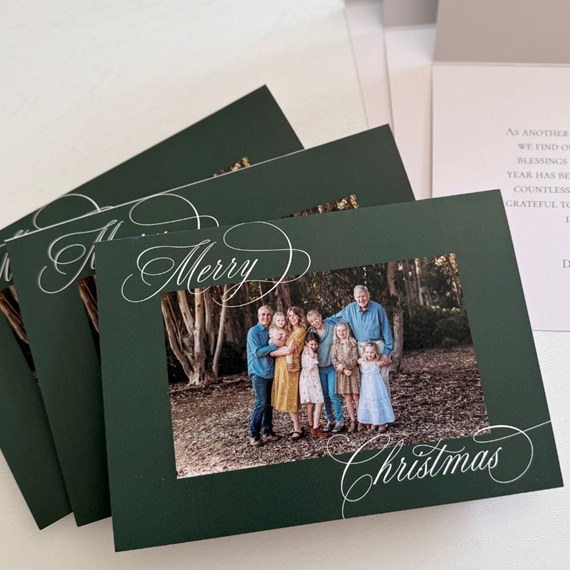 Christmas card with photo placeholder and script text